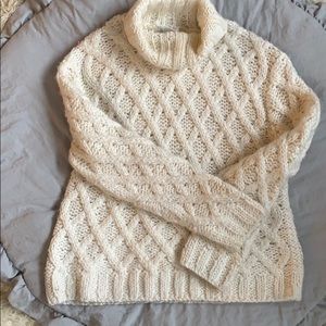 Cream croquet turtle neck sweater